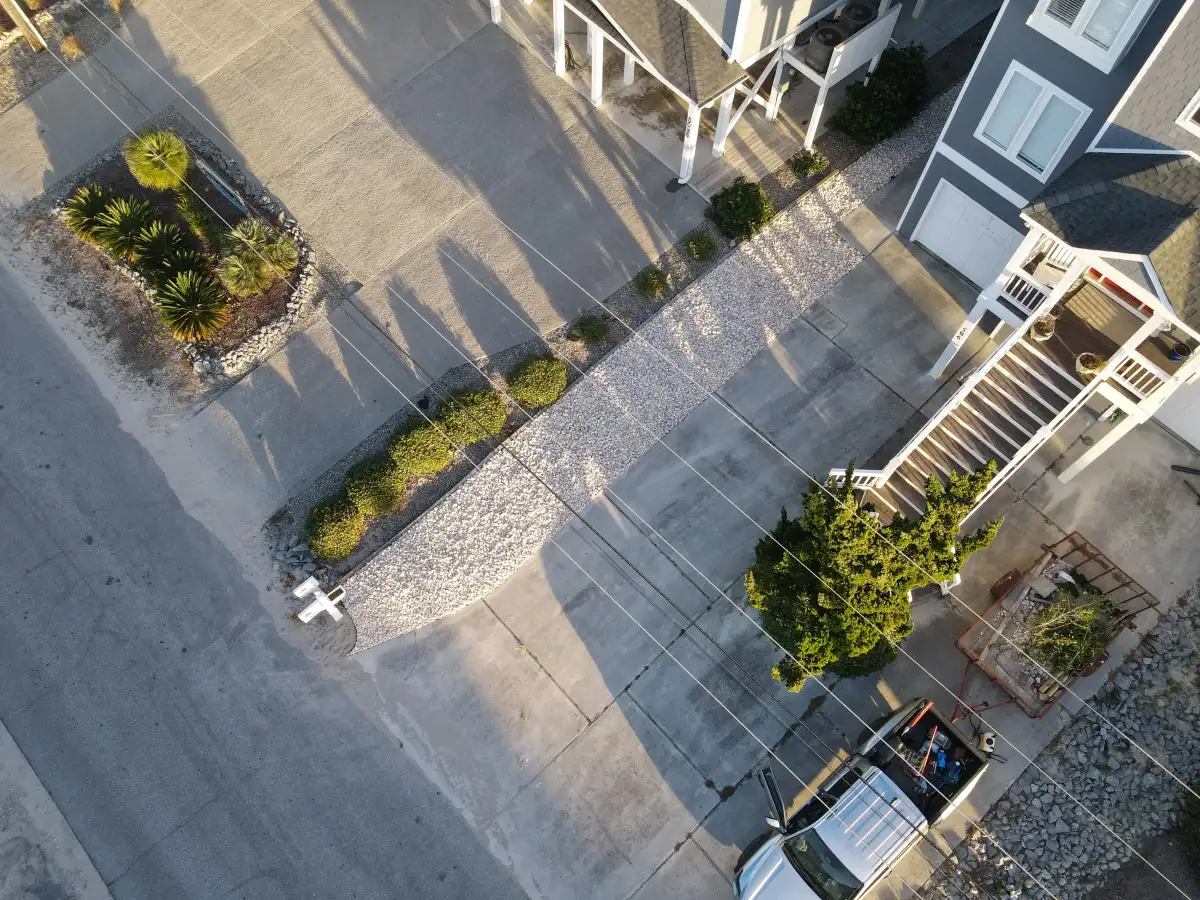 Full landscape design with stone border and plantings in eastern NC