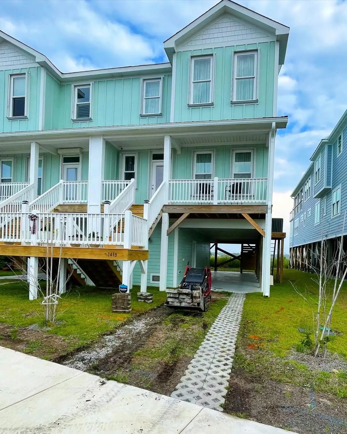 Custom outdoor kitchen with built-in grill and paver patio in Wilmington NC
