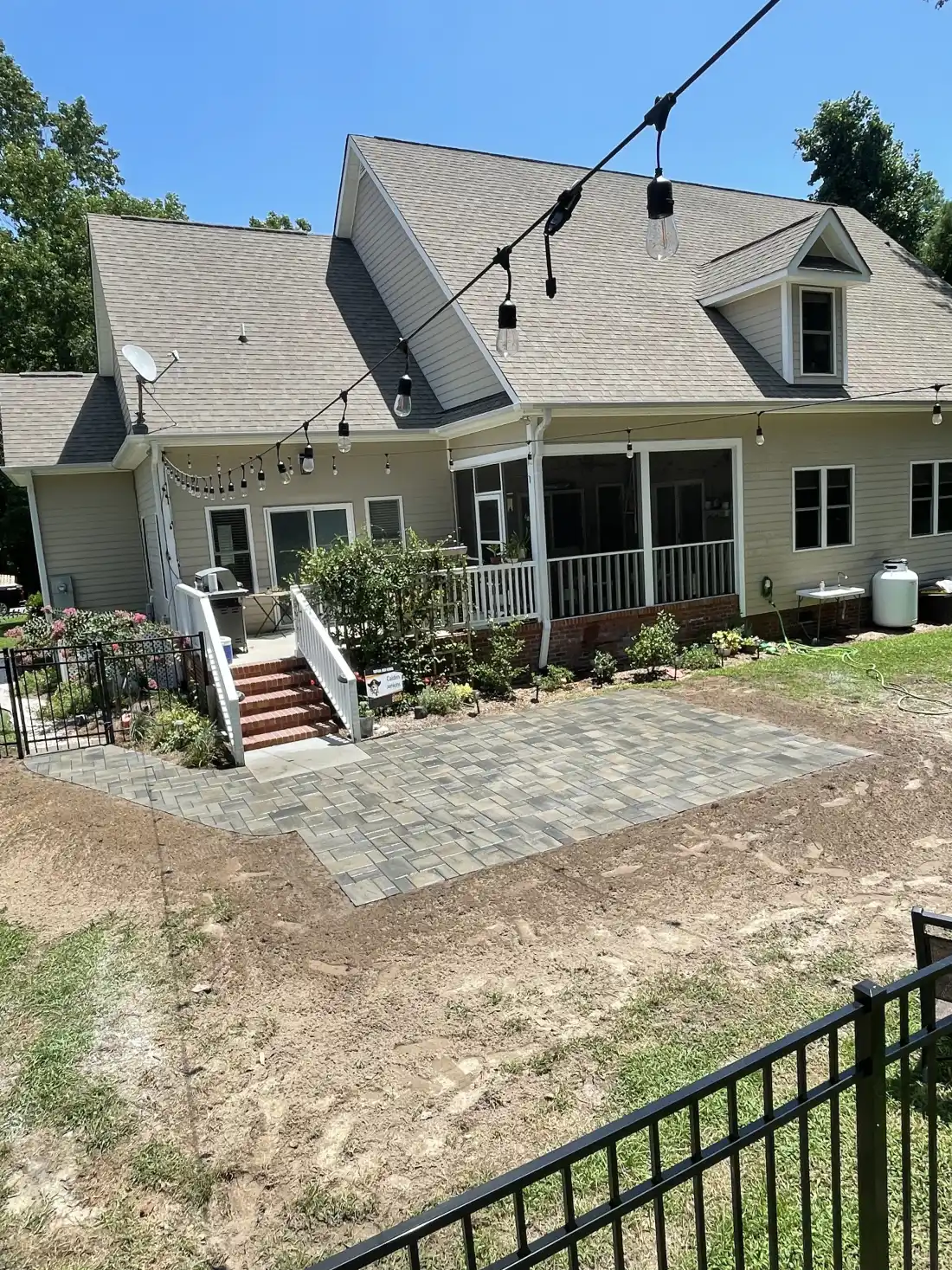 Paver walkway and patio combination with stone retaining edge in eastern NC