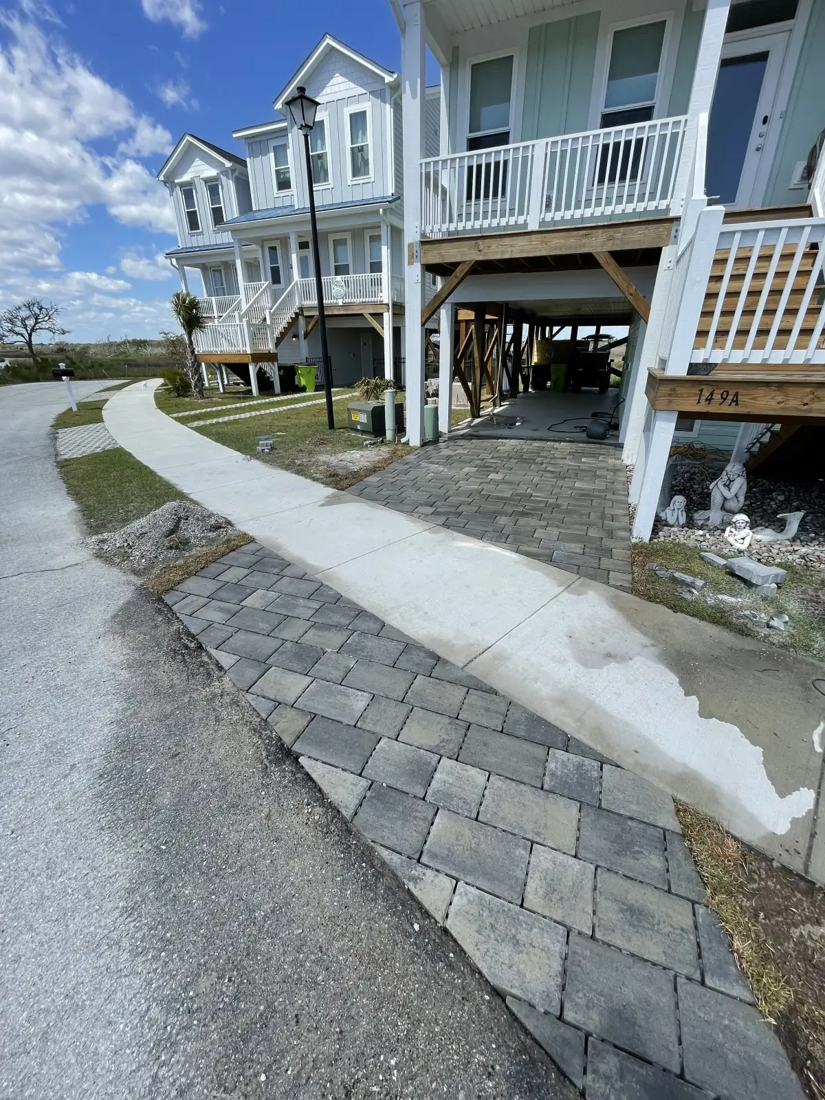 Wood deck with pergola overlooking luxury outdoor living space in Wilmington NC